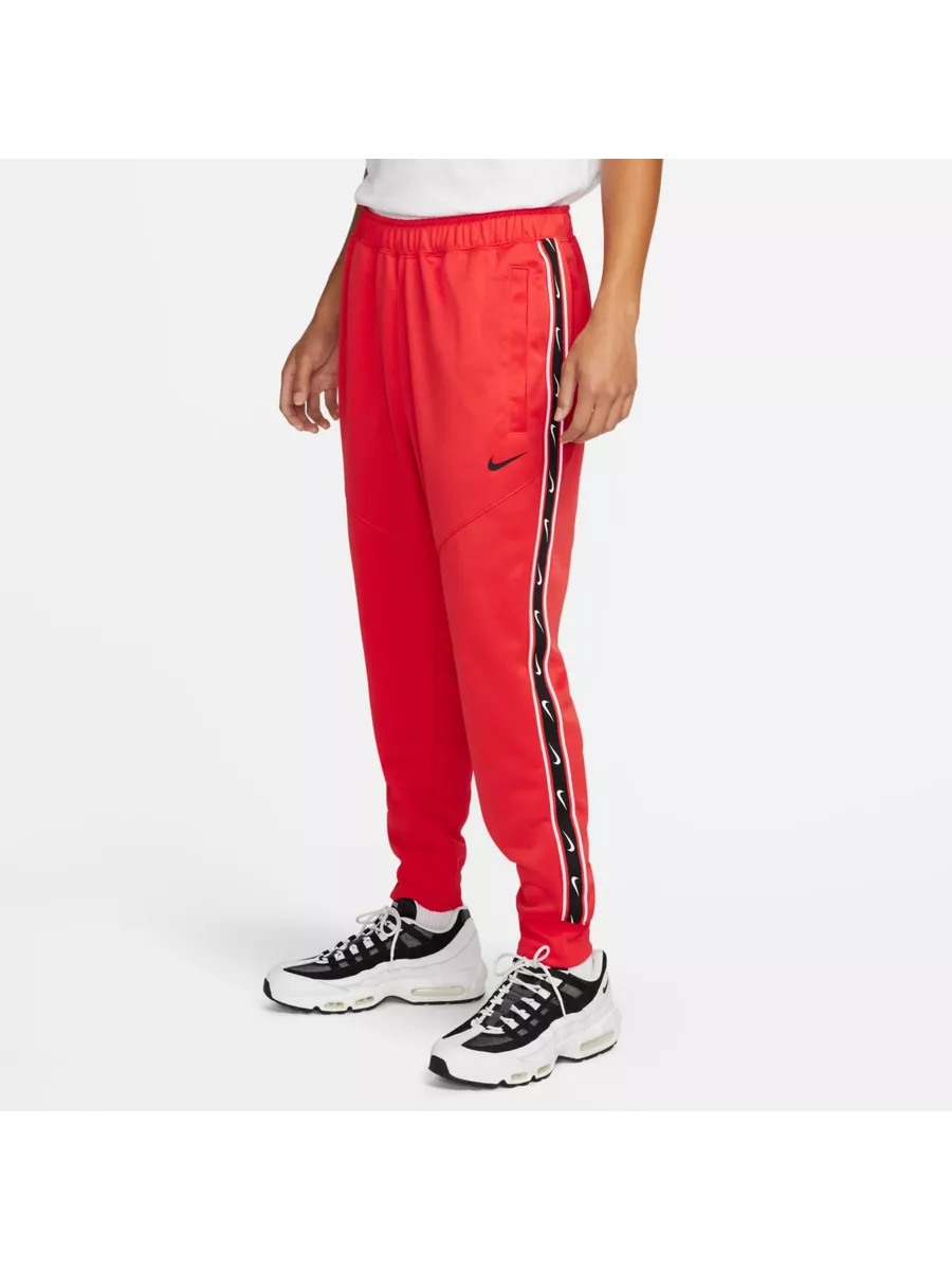 Nike sportswear taped pants sale